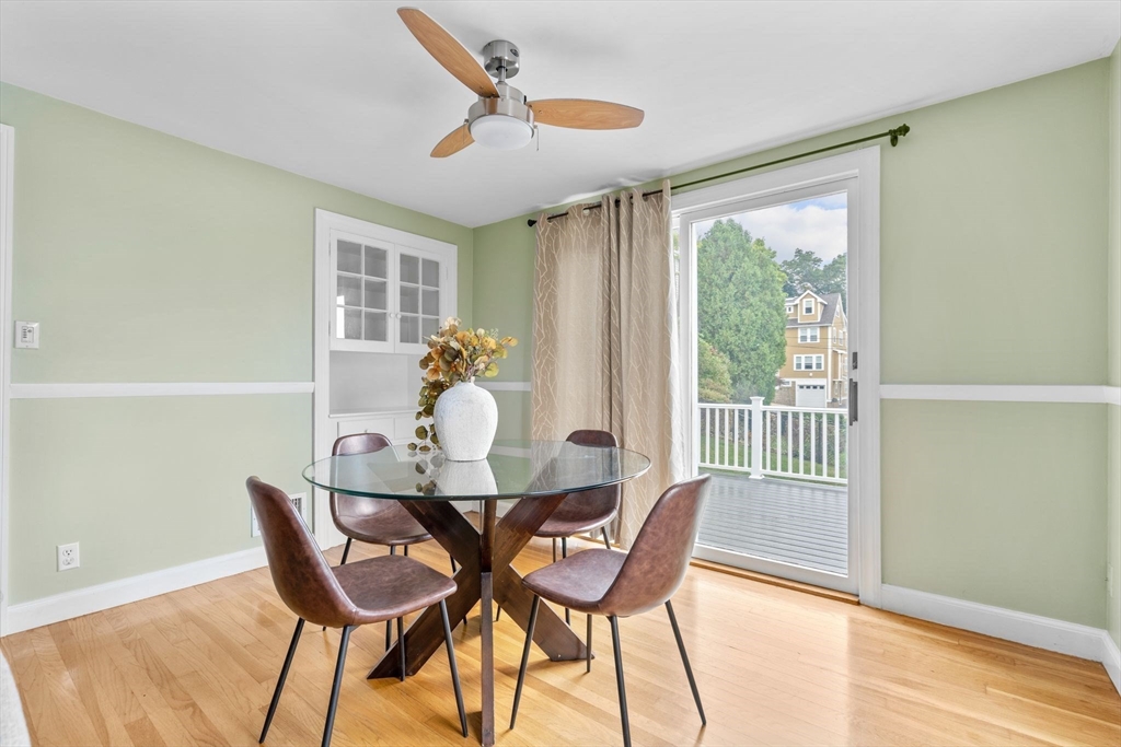 29 Walnut Terrace Arlington, MA 02476 - Photo 9 of 41 a dining room with furniture and wooden floor