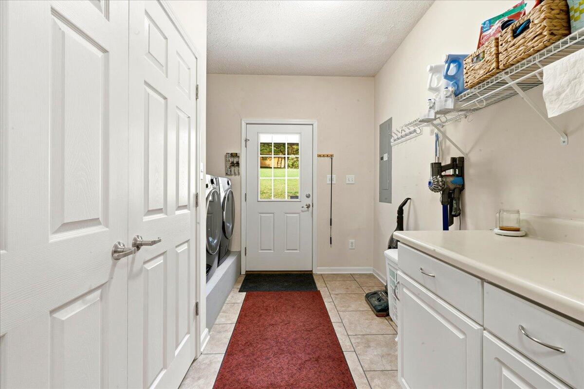 218 Mt Moriah Road Eagle Rock, VA 24085 - Photo 21 of 38 a view of a hallway with a white walls and wooden floor