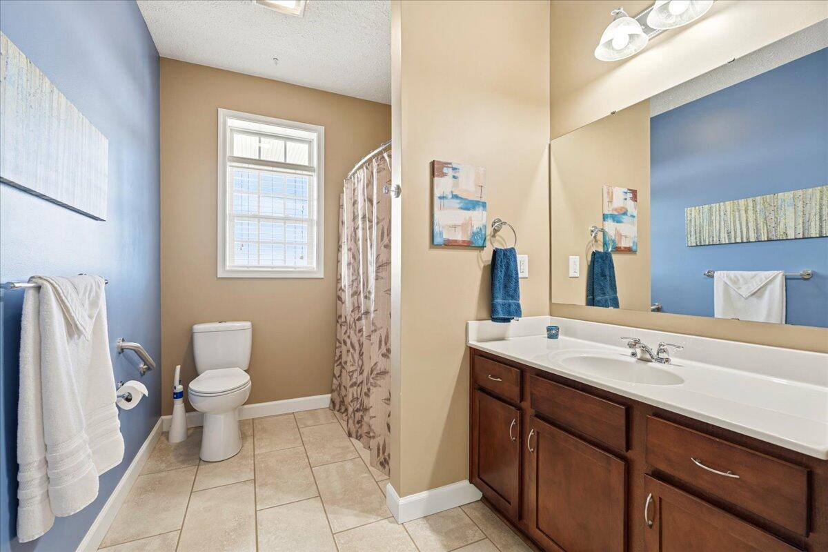 218 Mt Moriah Road Eagle Rock, VA 24085 - Photo 22 of 38 a bathroom with a sink toilet and shower