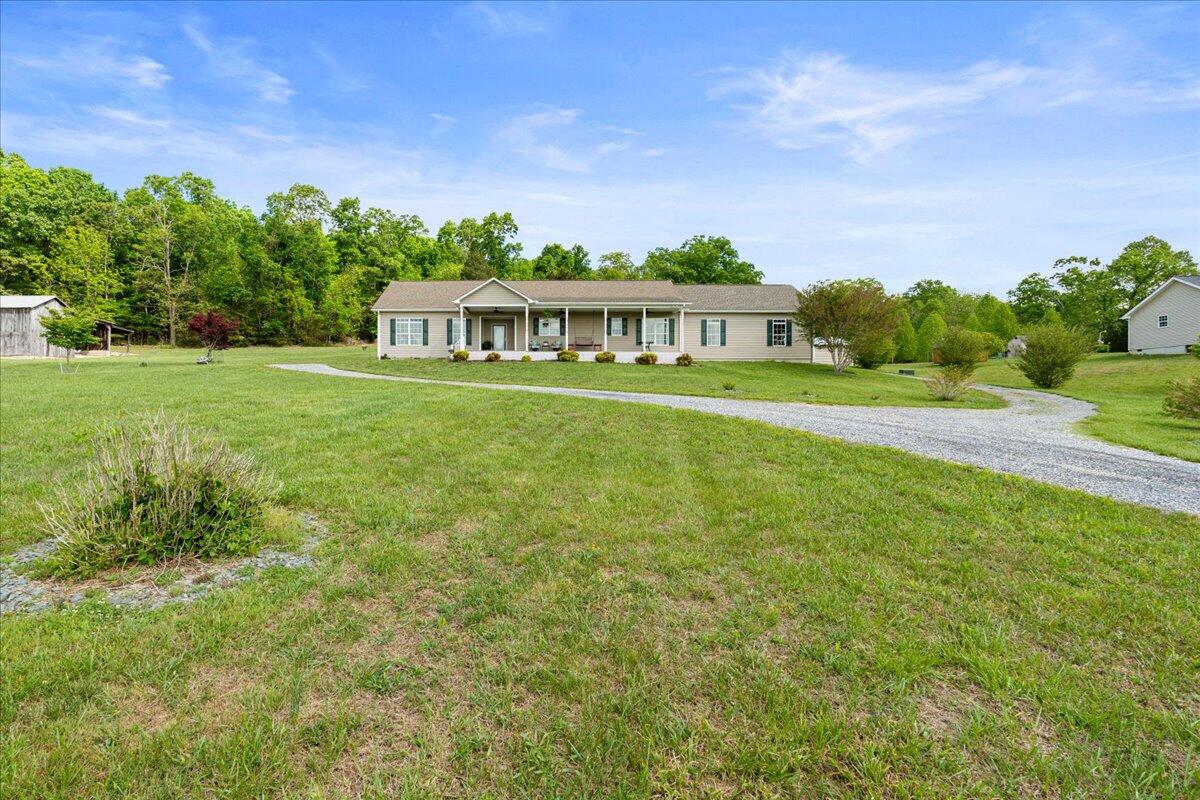 218 Mt Moriah Road Eagle Rock, VA 24085 - Photo 32 of 38 a front view of a house with a garden