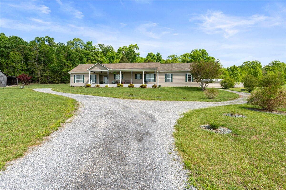 218 Mt Moriah Road Eagle Rock, VA 24085 - Photo 5 of 38 a front view of a house with a yard