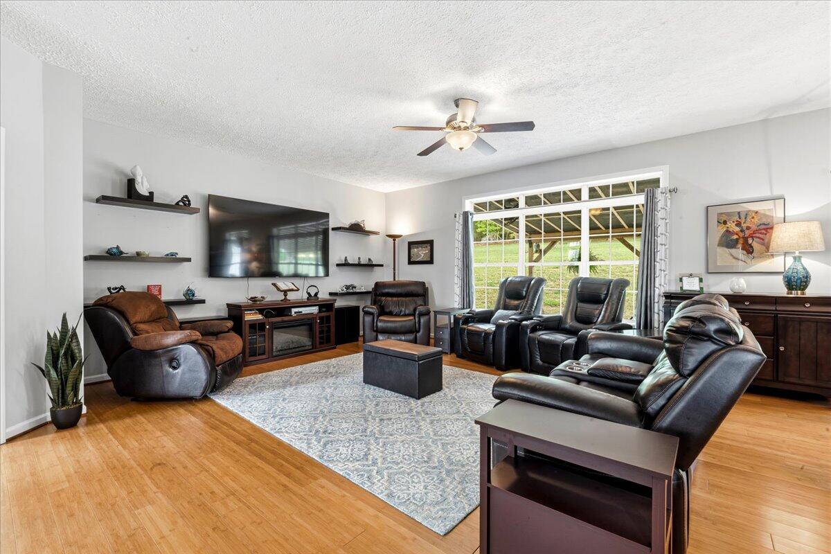 218 Mt Moriah Road Eagle Rock, VA 24085 - Photo 10 of 38 a living room with furniture kitchen view and a large window