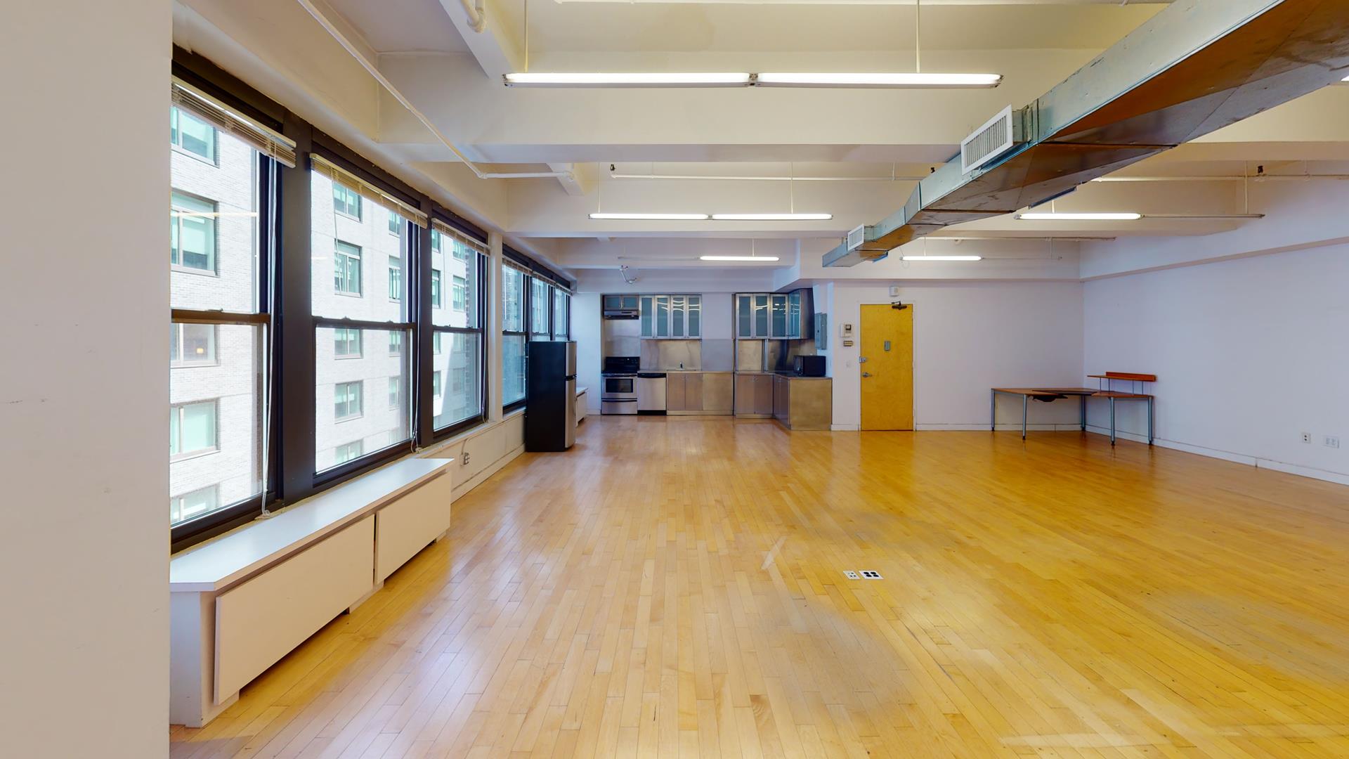 315 West 36th Street, Unit 12B Manhattan, NY 10018 - Photo 15 of 33 a view of an empty room with a window