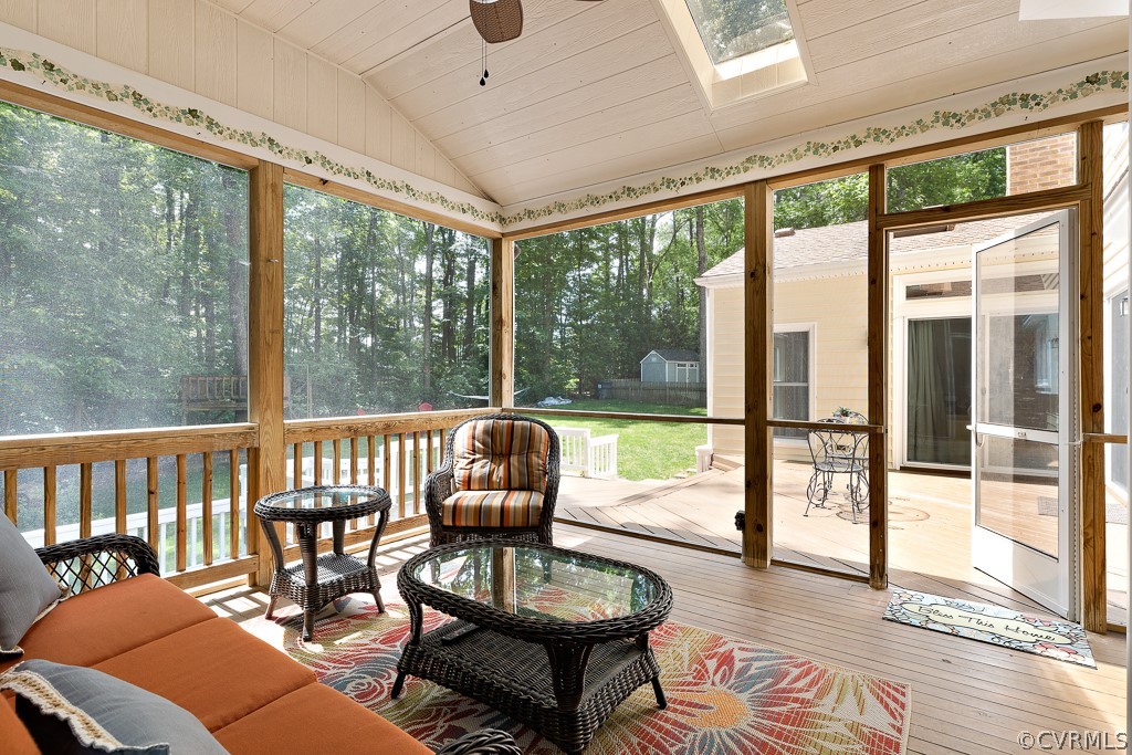 13903 Eastbluff Road Midlothian, VA 23112 - Photo 12 of 45 a living room with furniture and a floor to ceiling window