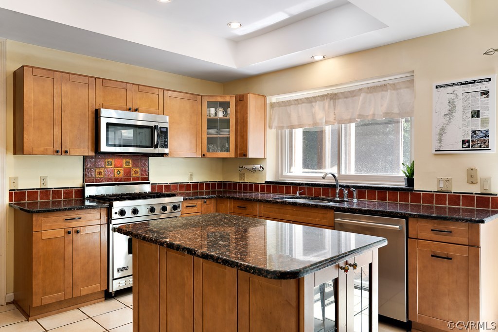 13903 Eastbluff Road Midlothian, VA 23112 - Photo 14 of 45 a kitchen with granite countertop a sink and a stove top oven with granite countertops