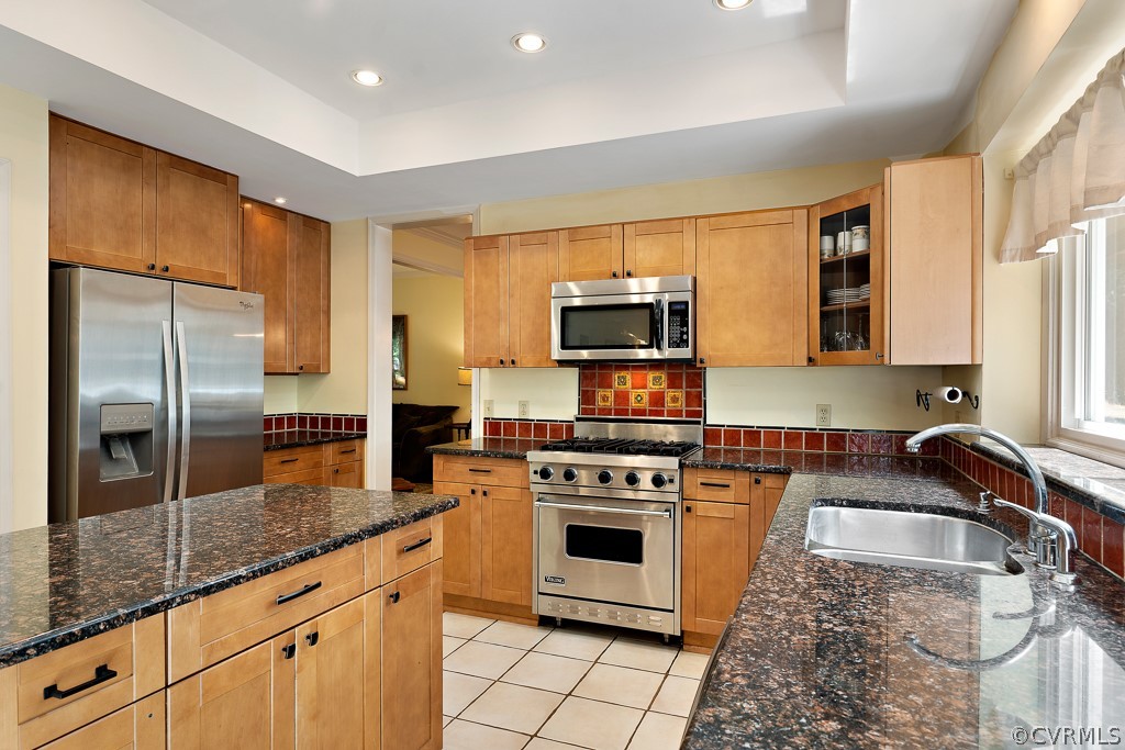 13903 Eastbluff Road Midlothian, VA 23112 - Photo 15 of 45 a kitchen with granite countertop a sink a counter top space appliances and cabinets