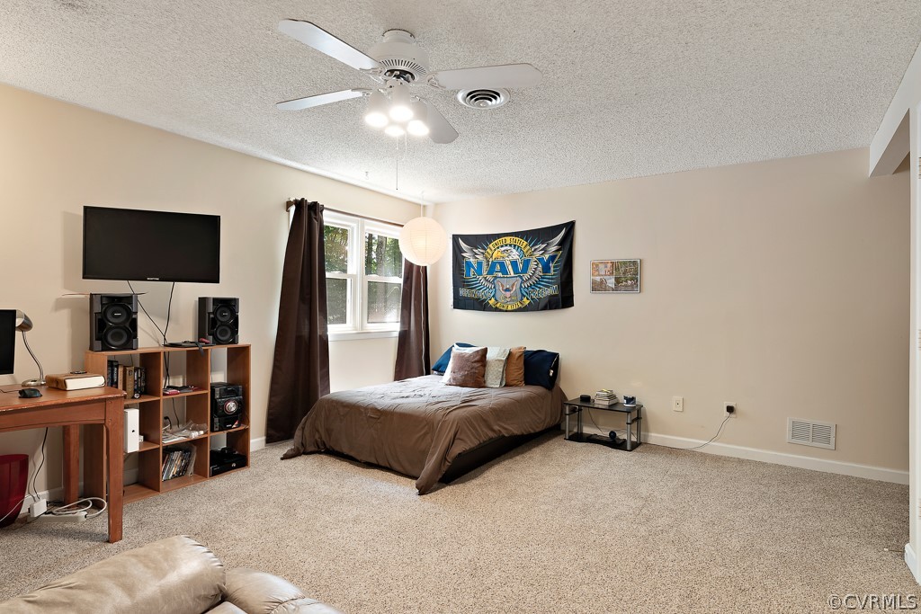 13903 Eastbluff Road Midlothian, VA 23112 - Photo 24 of 45 a bedroom with bed and tv