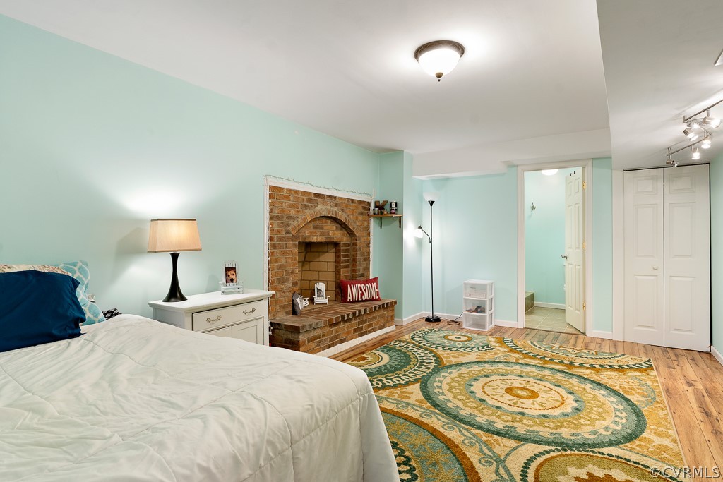 13903 Eastbluff Road Midlothian, VA 23112 - Photo 37 of 45 a bedroom with a bed and a chandelier
