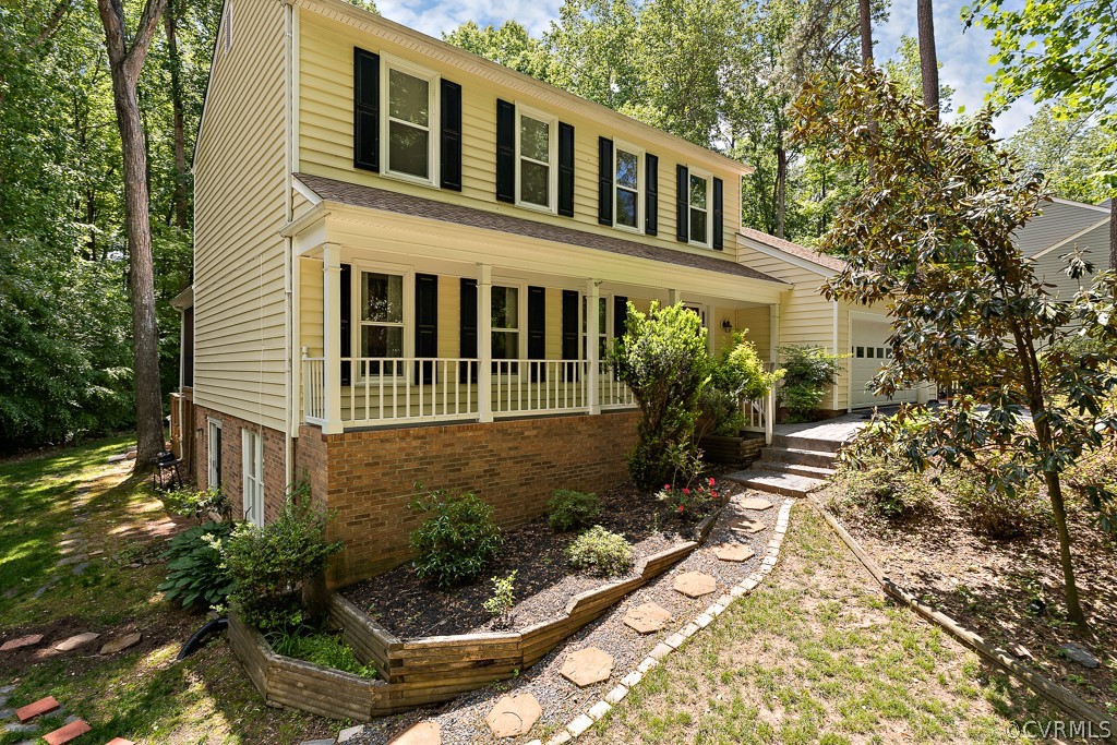 13903 Eastbluff Road Midlothian, VA 23112 - Photo 4 of 45 a front view of a house with garden