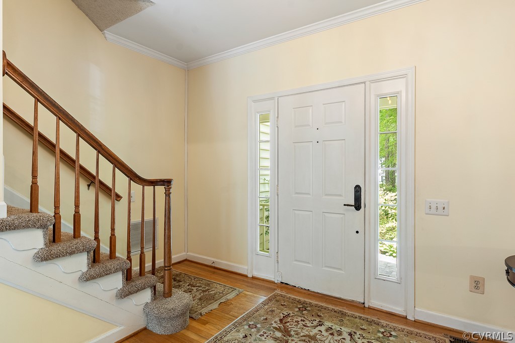 13903 Eastbluff Road Midlothian, VA 23112 - Photo 6 of 45 a view of an entryway with wooden floor