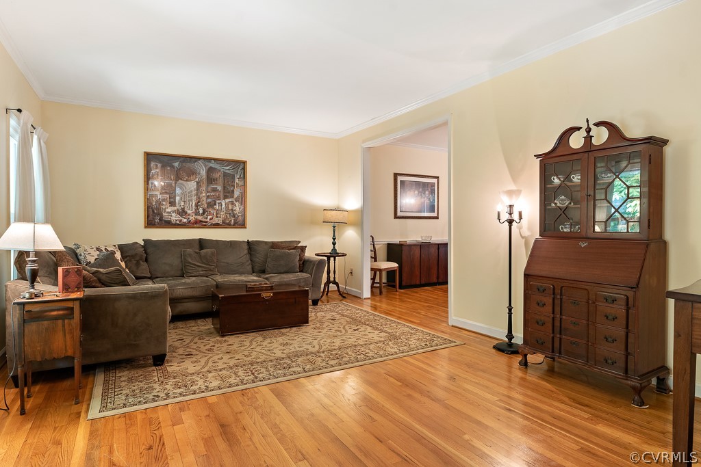 13903 Eastbluff Road Midlothian, VA 23112 - Photo 7 of 45 a living room with furniture and a wooden floor
