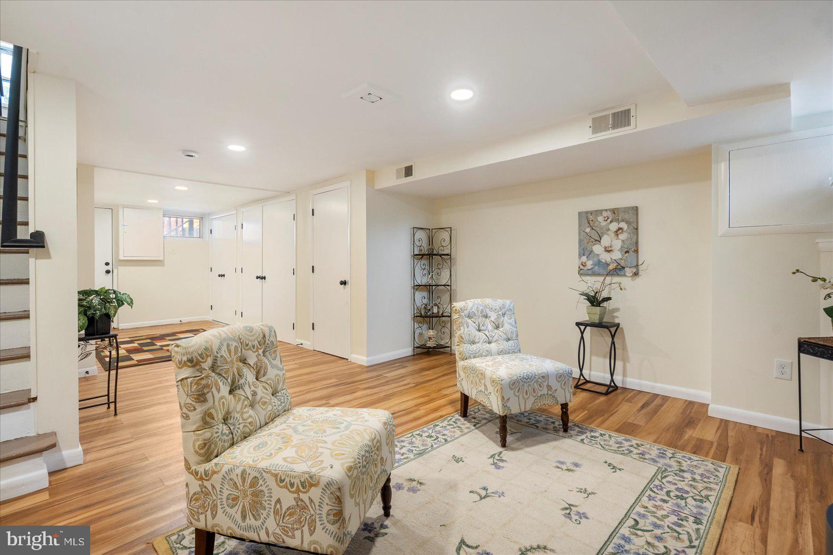 7932 Kavanagh Road Dundalk, MD 21222 - Photo 20 of 39 a living room with furniture and wooden floor