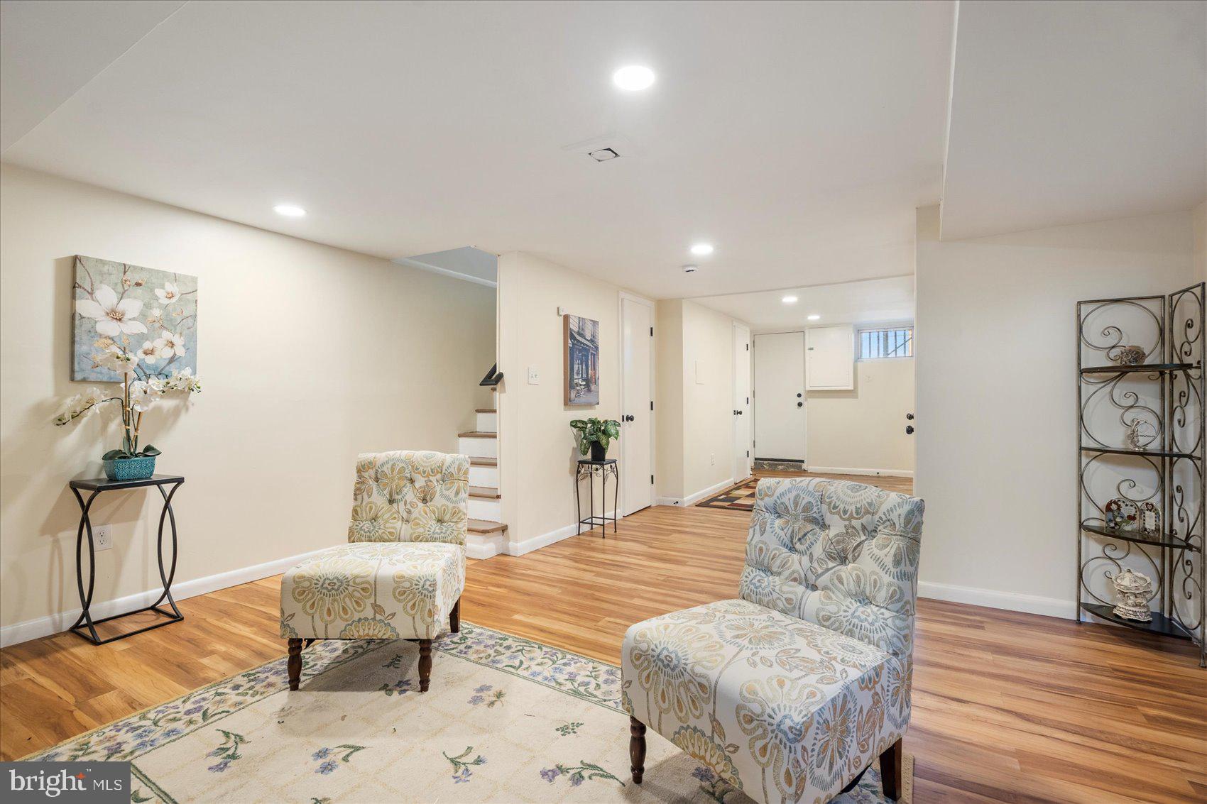 7932 Kavanagh Road Dundalk, MD 21222 - Photo 21 of 39 a living room with furniture and a wooden floor