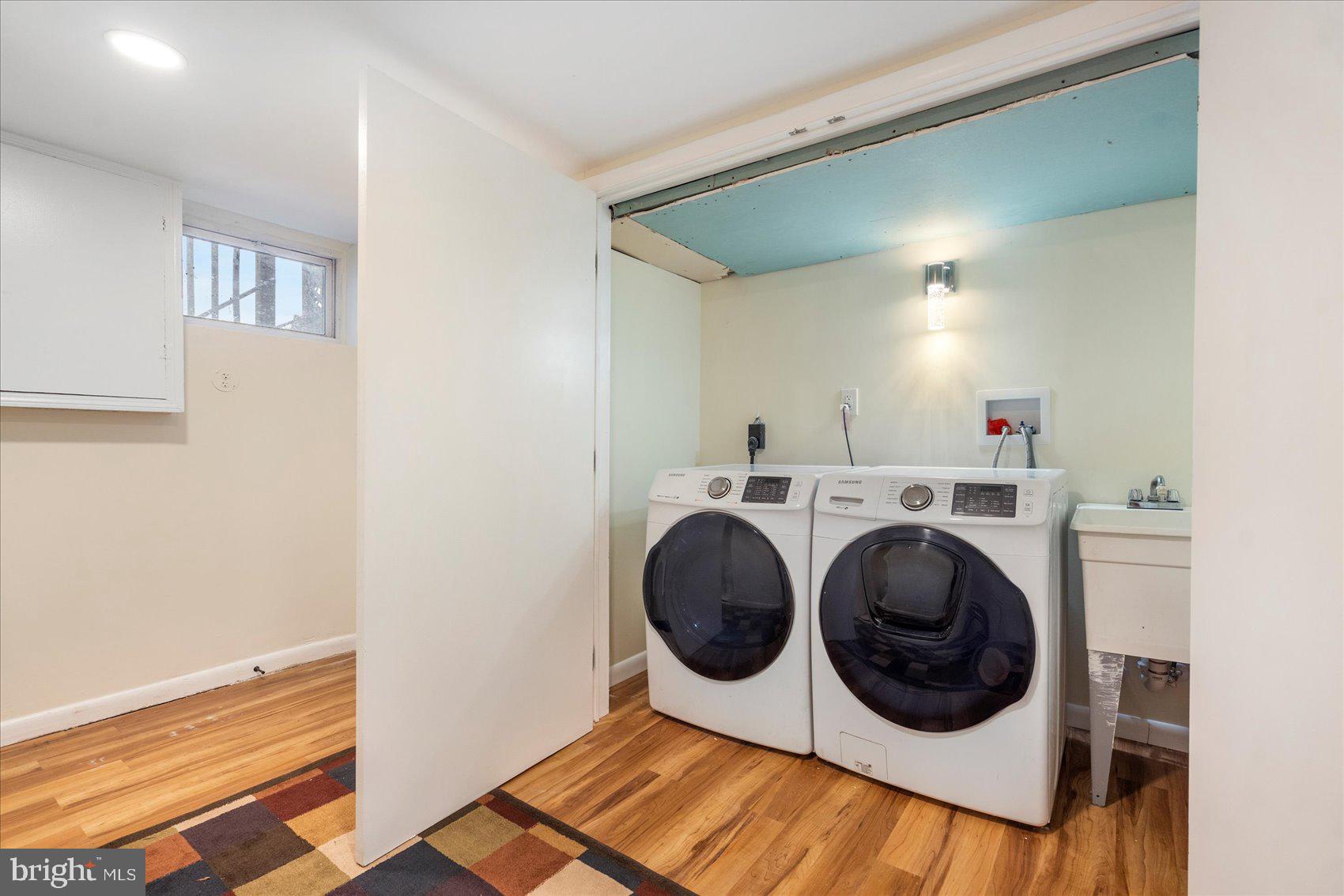 7932 Kavanagh Road Dundalk, MD 21222 - Photo 23 of 39 a utility room with dryer and washer