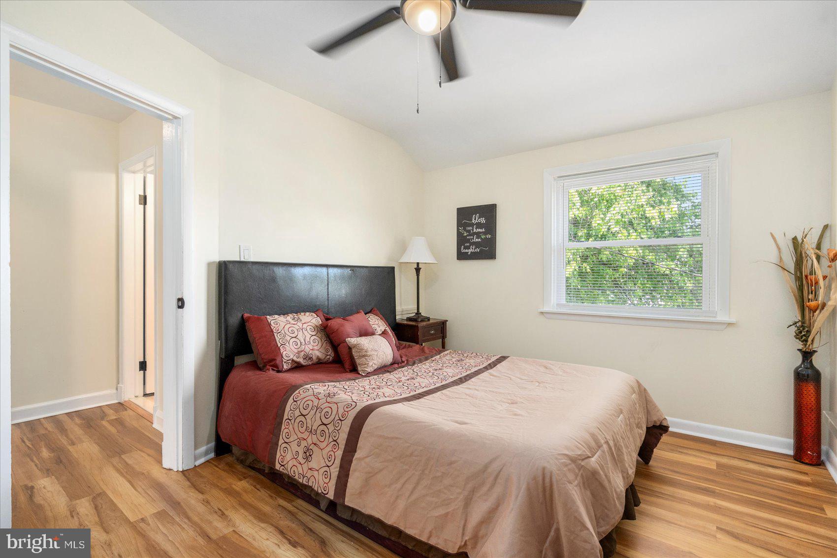7932 Kavanagh Road Dundalk, MD 21222 - Photo 31 of 39 a bedroom with a bed and window