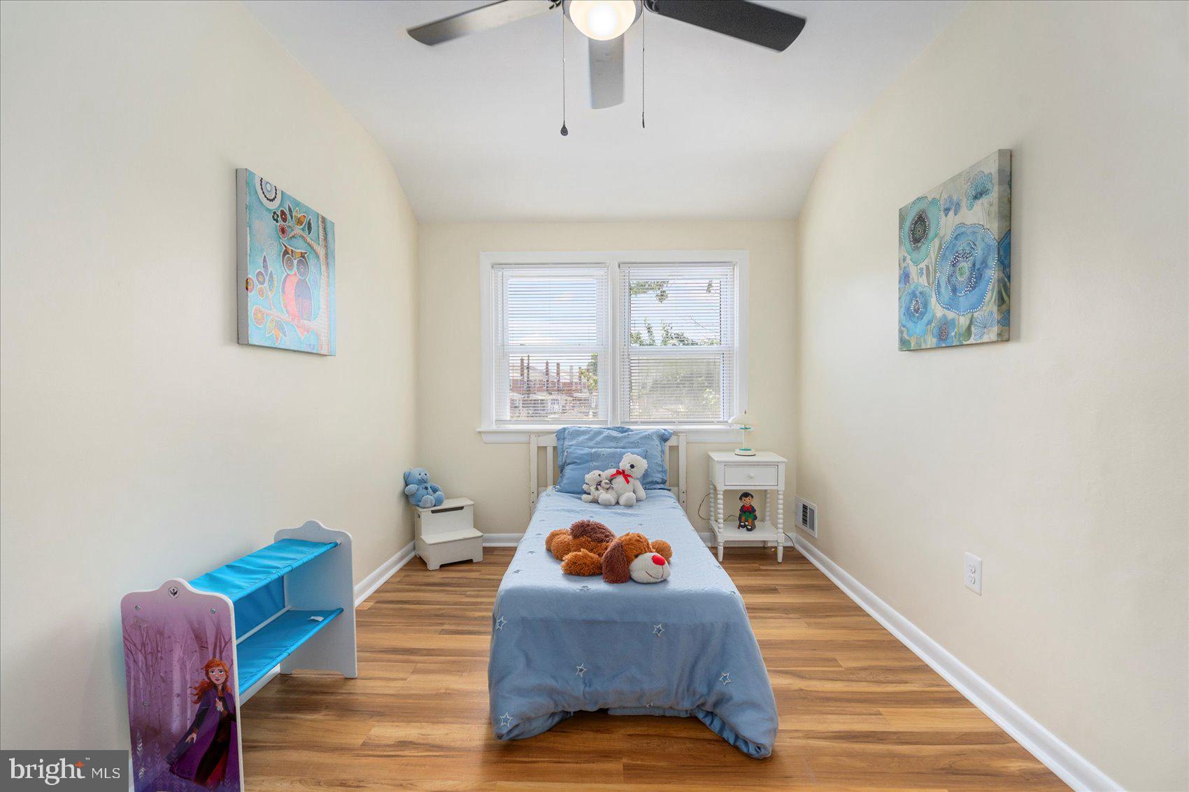 7932 Kavanagh Road Dundalk, MD 21222 - Photo 33 of 39 a bed room with furniture and wooden floor