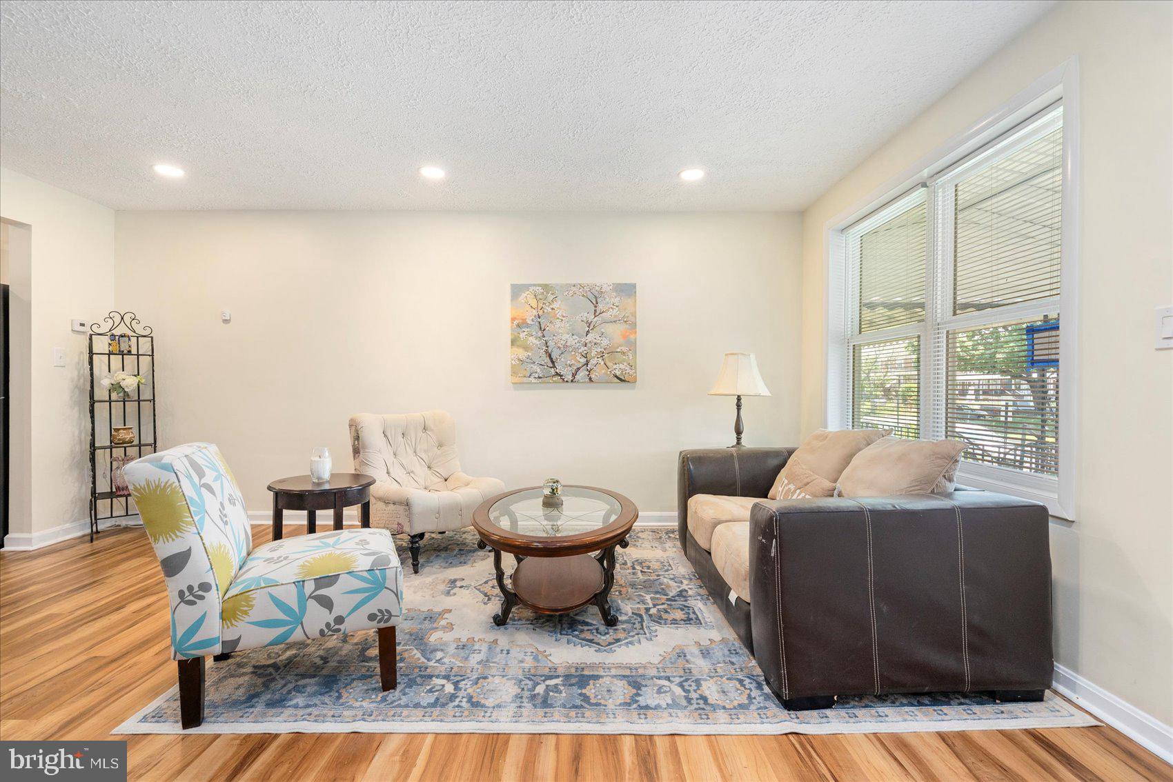 7932 Kavanagh Road Dundalk, MD 21222 - Photo 5 of 39 a living room with furniture and a large window