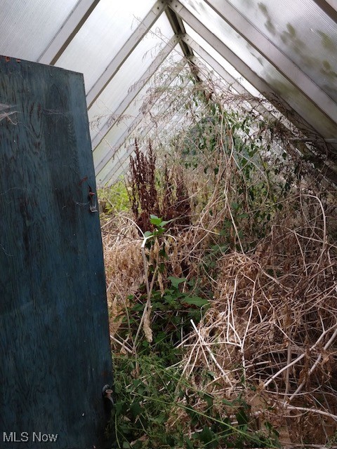 6834 Chapel Road Madison, OH 44057 - Photo 40 of 48 Greenhouse went from this when purchased in 2019...