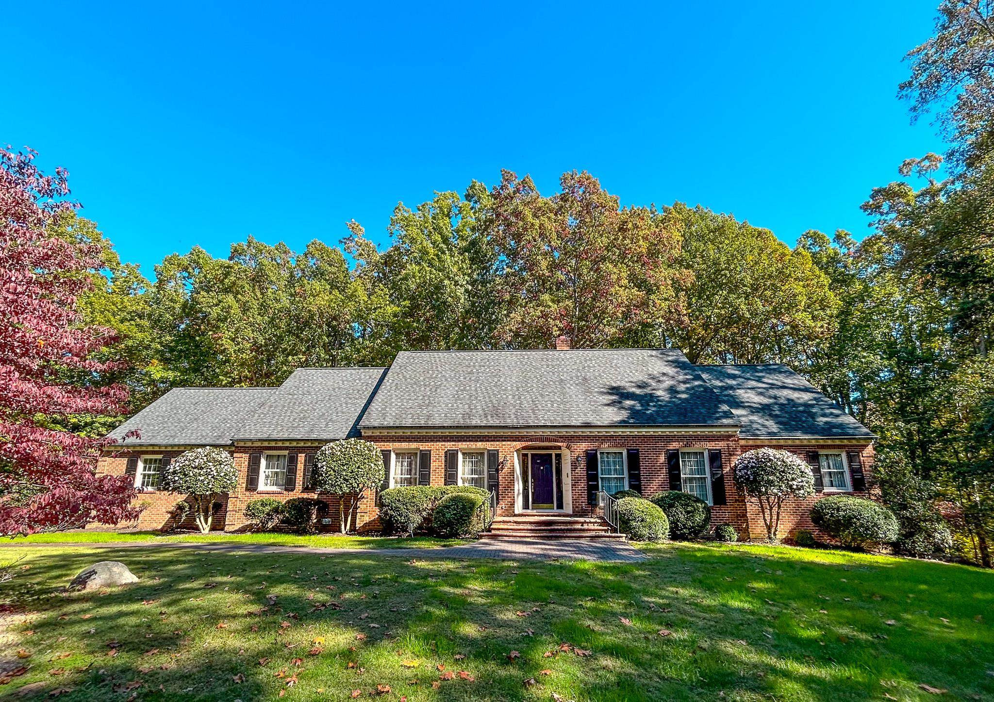 186 Old Salem Road Roxboro, NC 27573 - Photo 1 of 9 front view of a house with a yard