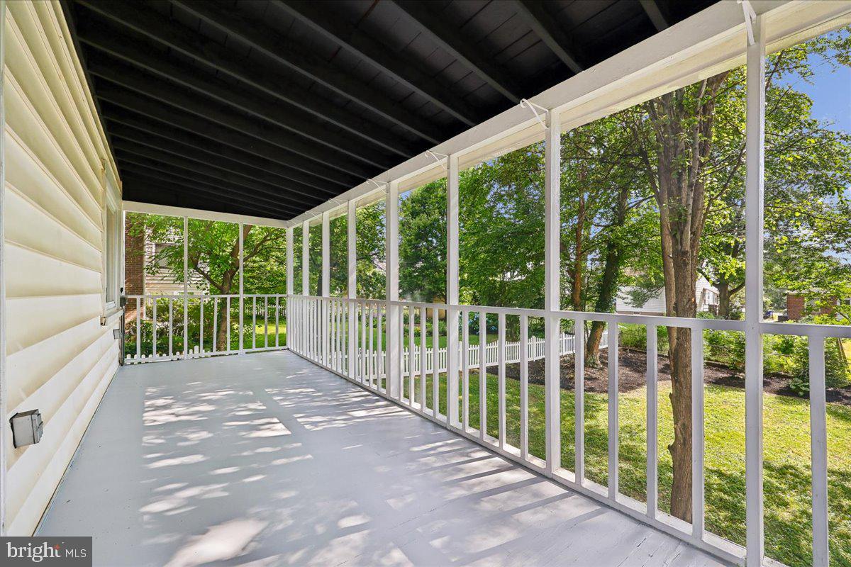 10404 Amherst Avenue Silver Spring, MD 20902 - Photo 31 of 49 Screened deck expands the rear
