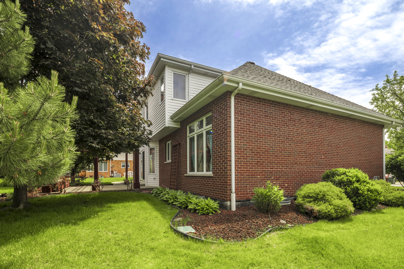 1071 Yamma Ridge New Lenox, IL 60451 - Photo 50 of 51 a front view of a house with a garden