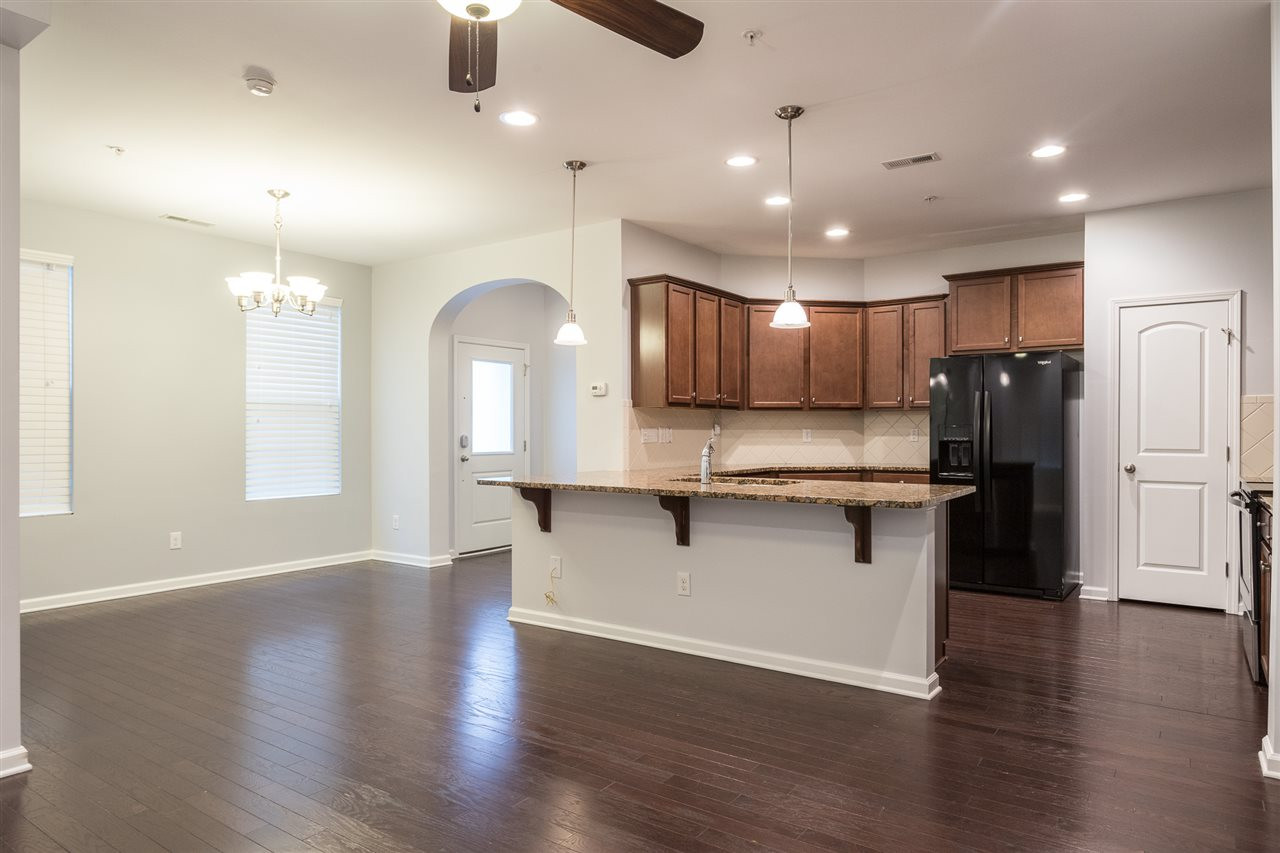 9929 Lynnberry Place Raleigh, NC 27617 - Photo 30 of 30 This view from the family rooms demonstrates the openness of this convenient floor plan. Kitchen
