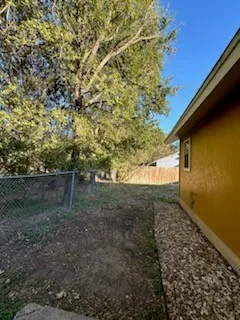a view of a lake with a backyard