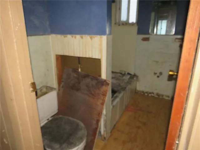 a bathroom with a sink and toilet