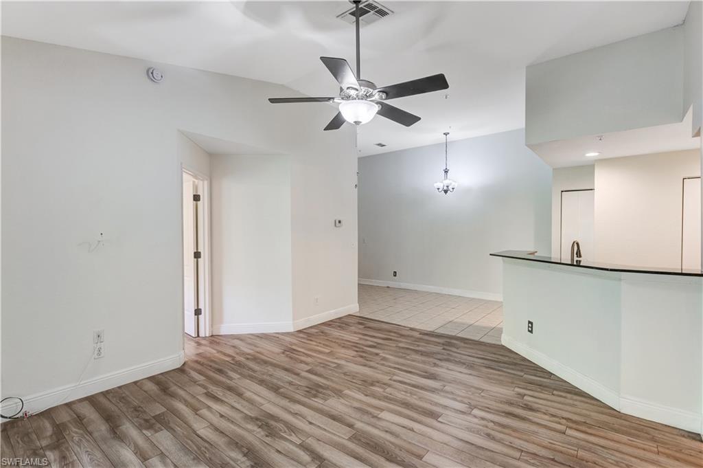 8285 Ibis Club Drive, Unit 807 Naples, FL 34104 - Photo 2 of 42 a view of a room with a ceiling fan