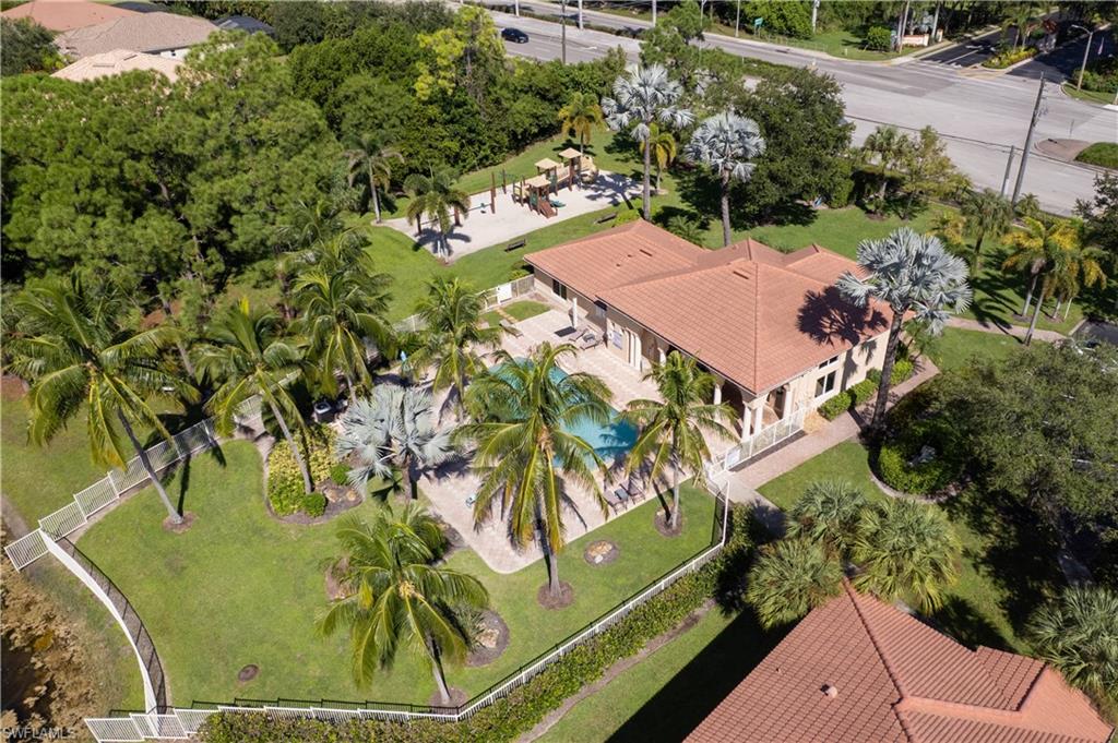 8285 Ibis Club Drive, Unit 807 Naples, FL 34104 - Photo 39 of 42 an aerial view of a residential houses with yard