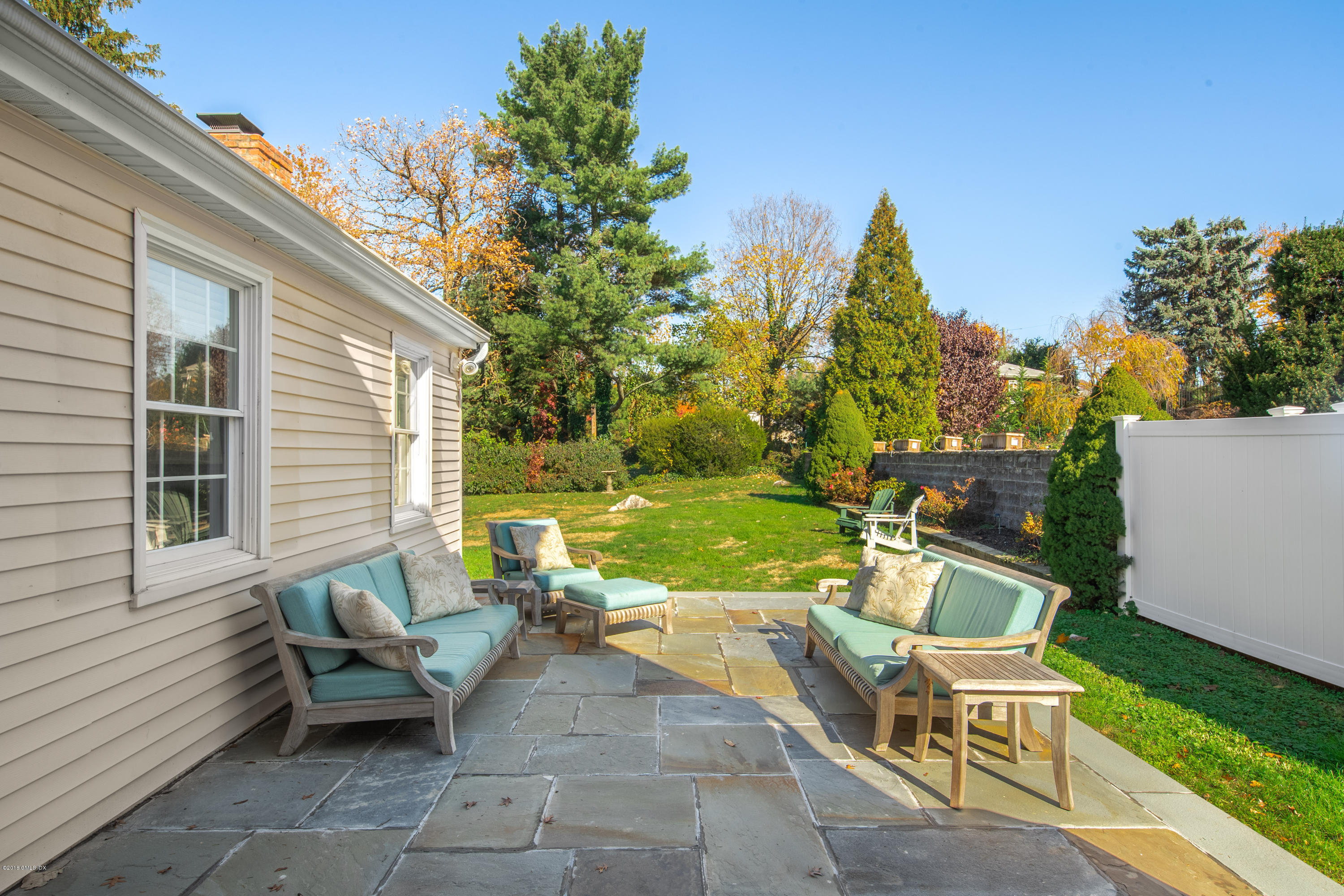 9 Thorn Hill Road Riverside, CT 06878 - Photo 11 of 19 a view of a patio with a yard
