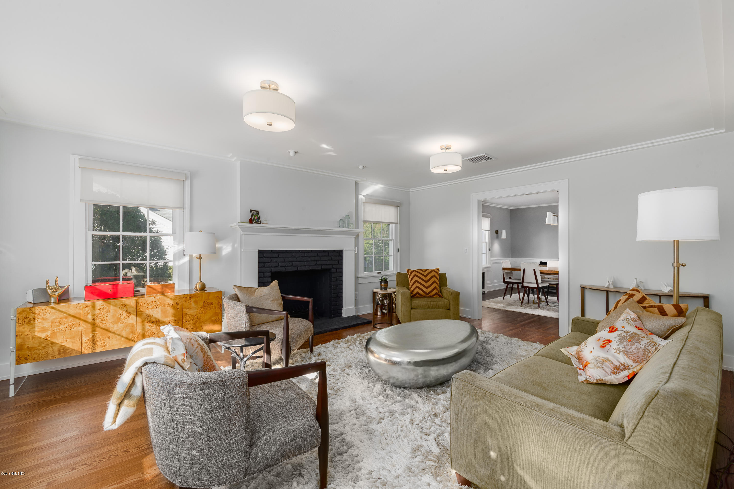 9 Thorn Hill Road Riverside, CT 06878 - Photo 2 of 19 a living room with furniture and a fireplace