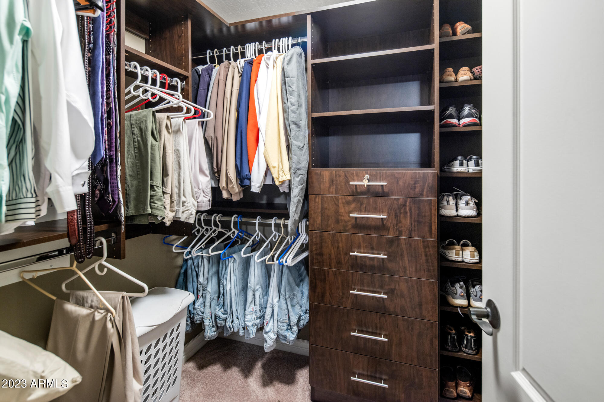 21320 North 56th Street, Unit 2132 Phoenix, AZ 85054 - Photo 17 of 30 Master walk in closet