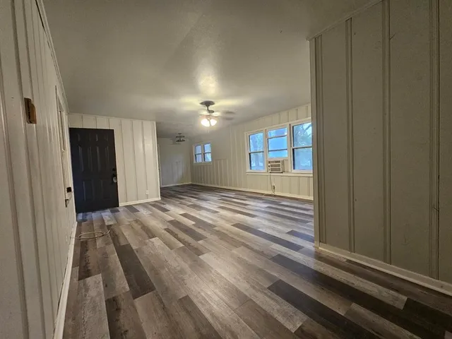 a view of livingroom and kitchen with hardwood floor