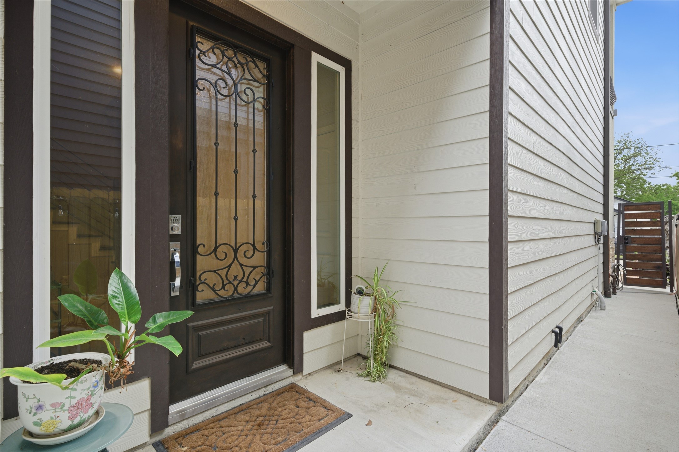 4412 New Orleans Street, Unit B Houston, TX 77020 - Photo 3 of 42 This elegant wooden and glass door enhances the home's charming exterior.