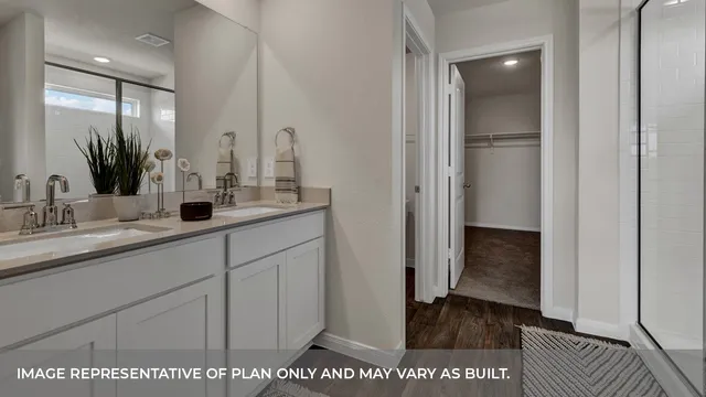 a shelf with cup and plates