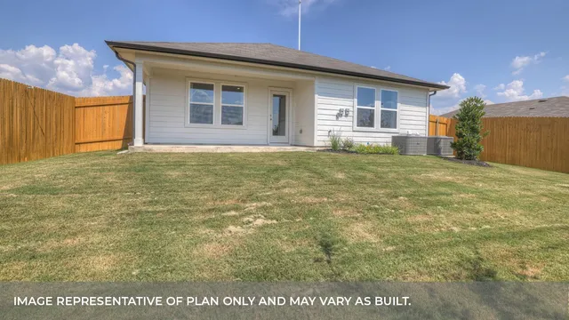 a picture of a bench in front of a wall