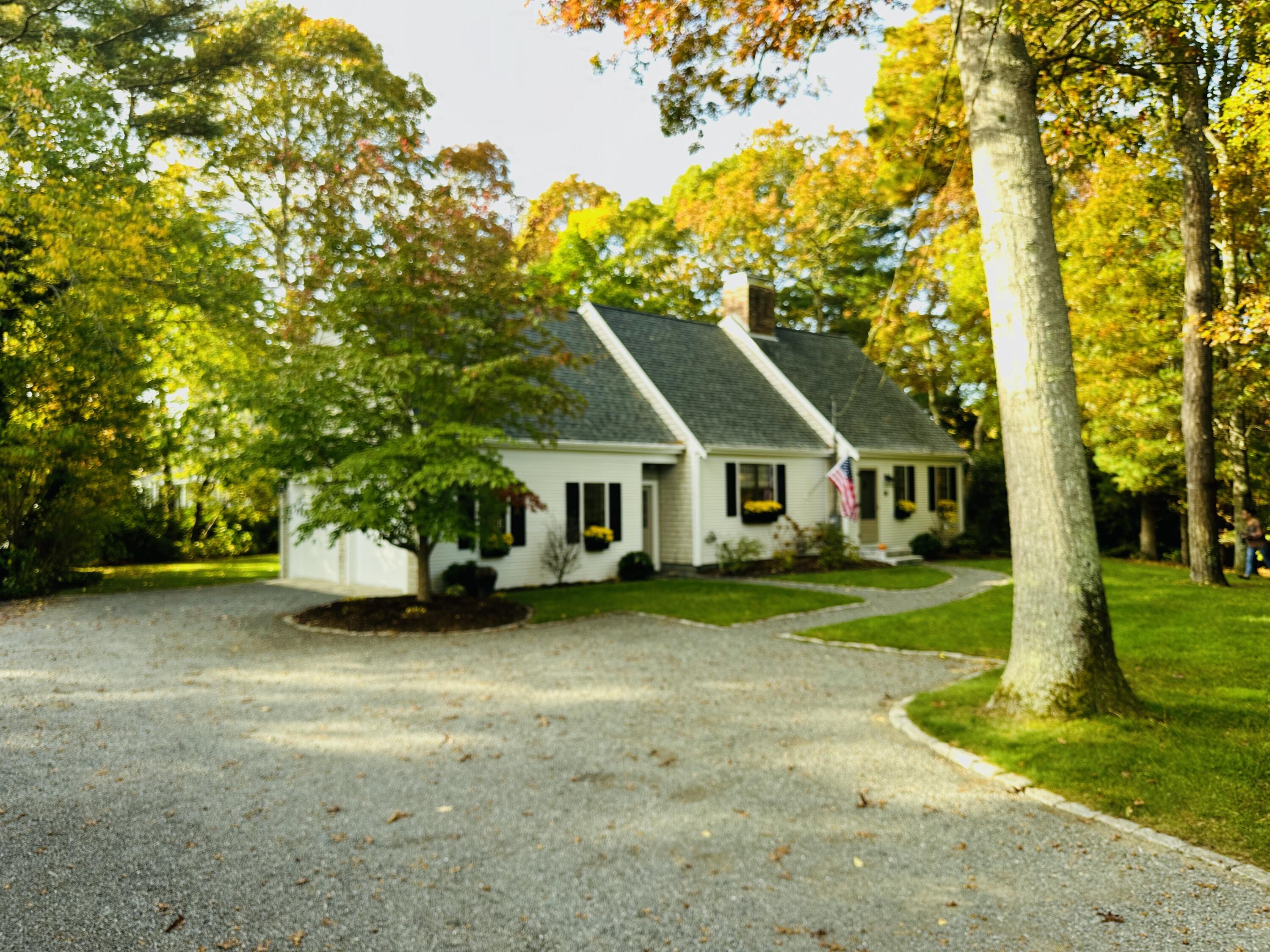 33 Waterfield Road Osterville, MA 02655 - Photo 1 of 40 a view of a house with a yard