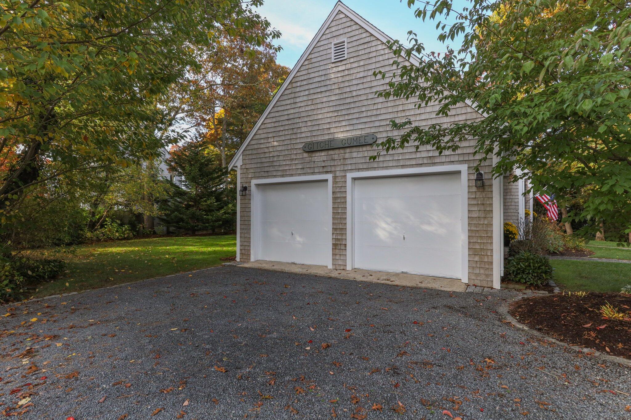33 Waterfield Road Osterville, MA 02655 - Photo 39 of 40 a view of a house with backyard and garden