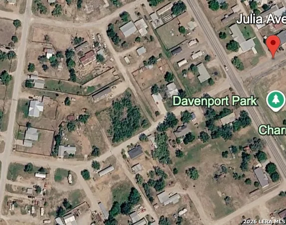 a view of a yard with an outdoor space