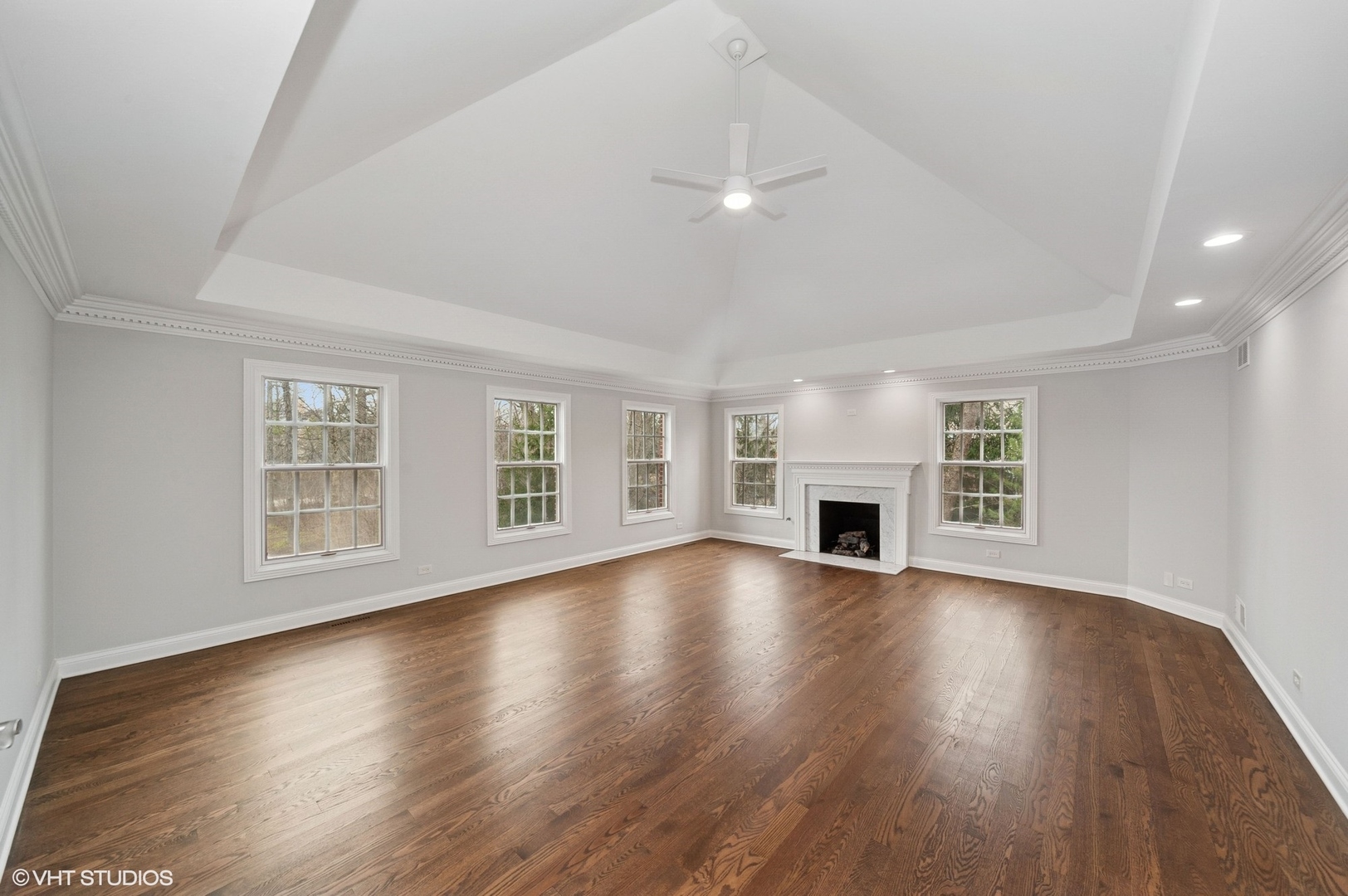 600 Broadsmoore Drive Lake Forest, IL 60045 - Photo 16 of 26 a view of a livingroom with wooden floor a fireplace and windows