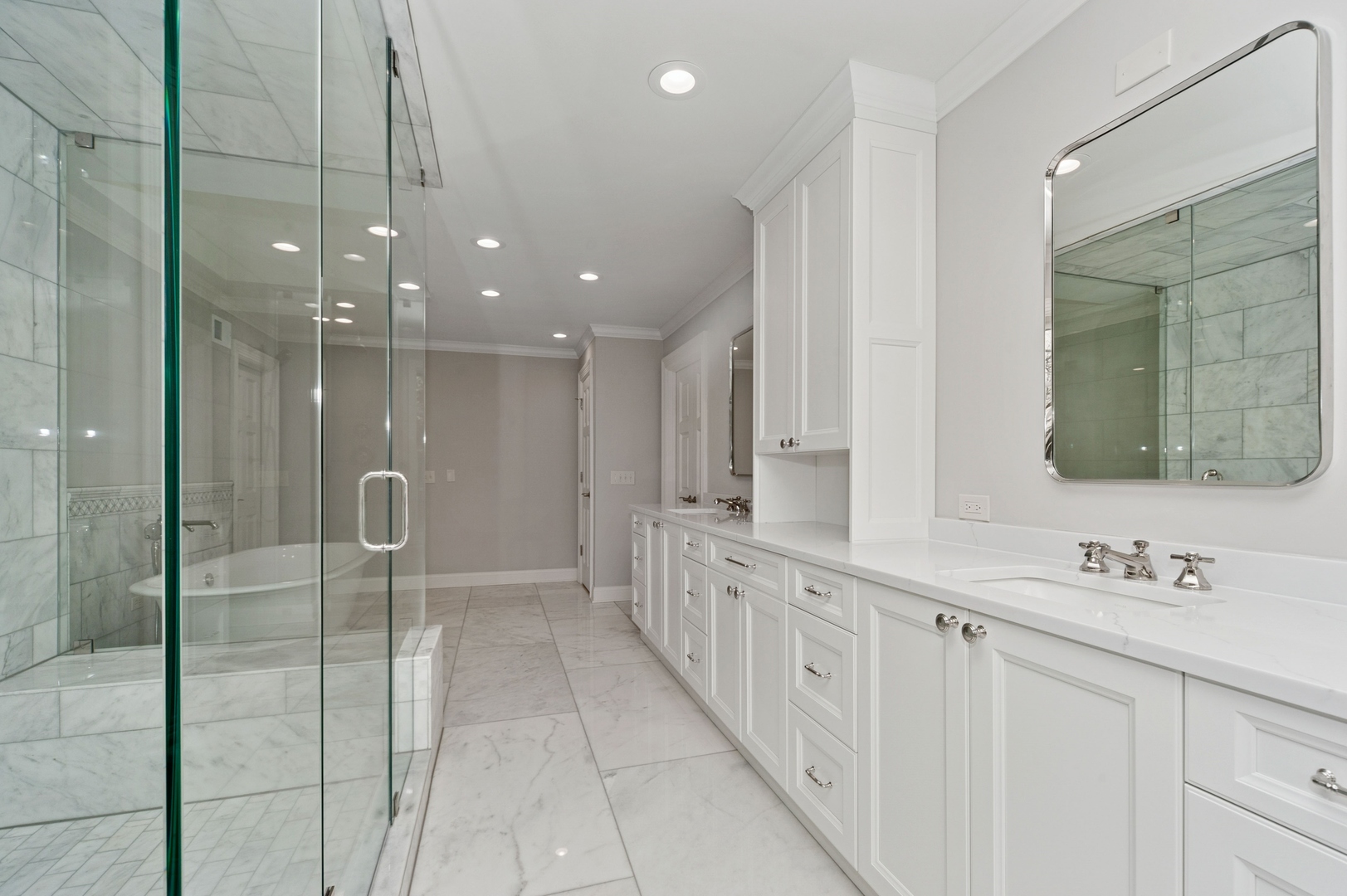 600 Broadsmoore Drive Lake Forest, IL 60045 - Photo 19 of 26 a bathroom with a mirror a sink and glass door