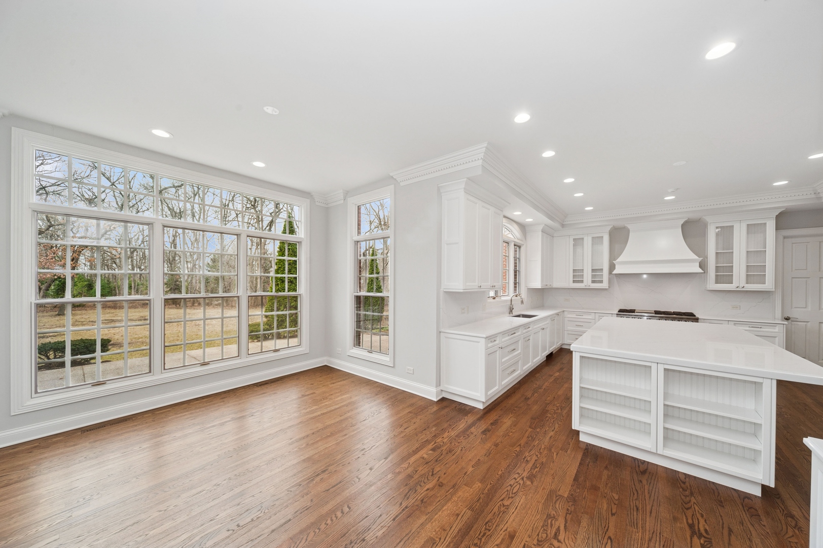 600 Broadsmoore Drive Lake Forest, IL 60045 - Photo 10 of 26 a large kitchen with a large window and wooden floor
