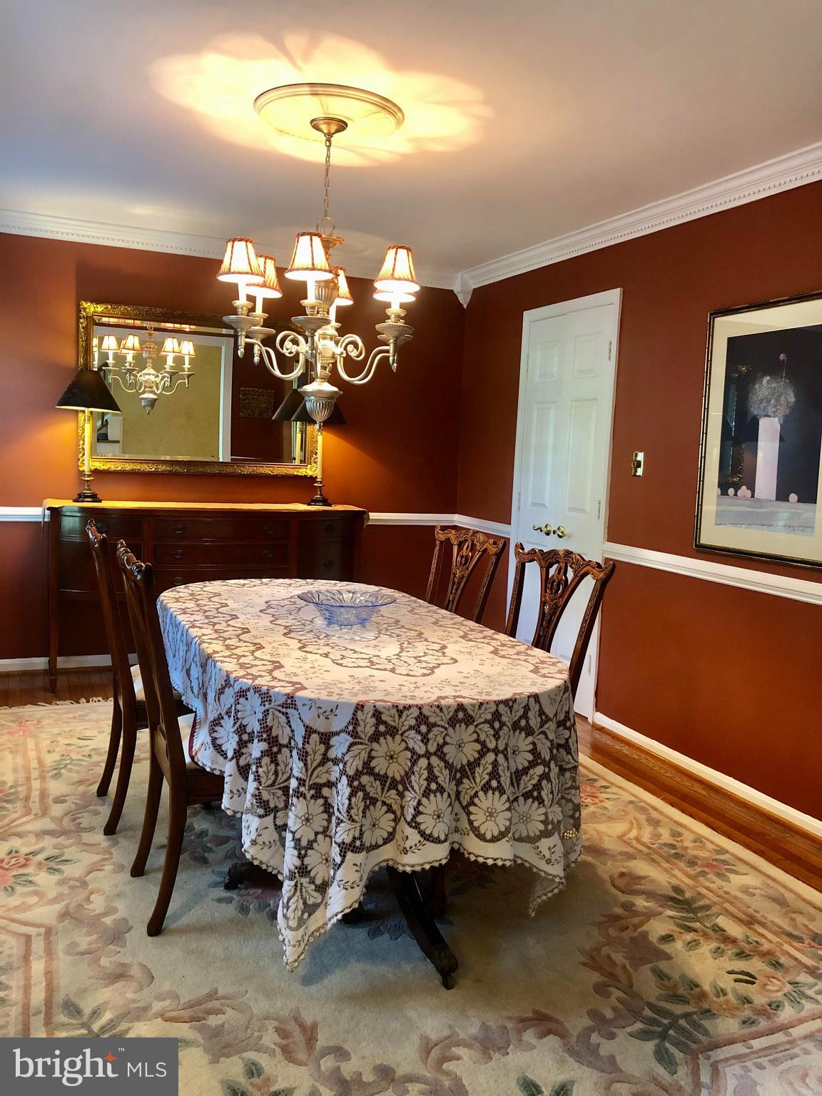 8715 Shadowlake Way Springfield, VA 22153 - Photo 11 of 56 Dining Room with Chair Rail and Crown Molding