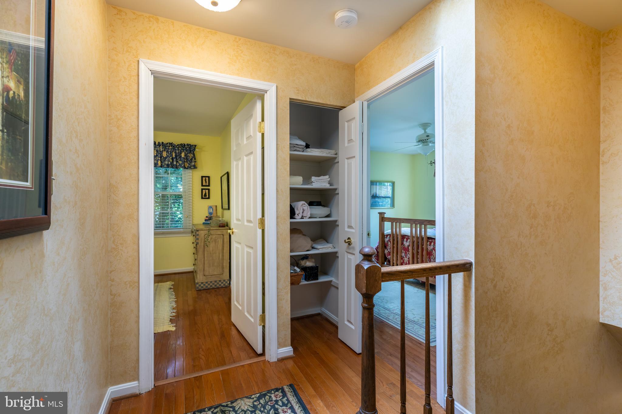 8715 Shadowlake Way Springfield, VA 22153 - Photo 39 of 56 Hallway to Bedrooms with Linen Closet