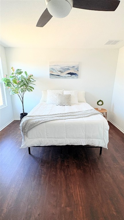 14300 Eientrill Pass Pflugerville, TX 78660 - Photo 13 of 19 a bedroom with a bed and a potted plant