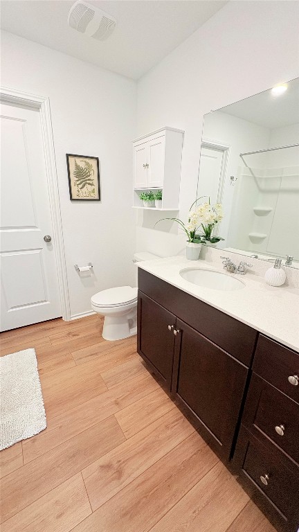 14300 Eientrill Pass Pflugerville, TX 78660 - Photo 14 of 19 a spacious bathroom with a granite countertop sink a toilet and a mirror