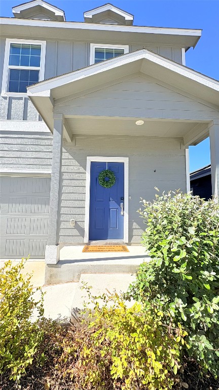 14300 Eientrill Pass Pflugerville, TX 78660 - Photo 2 of 19 a front view of a house with a yard