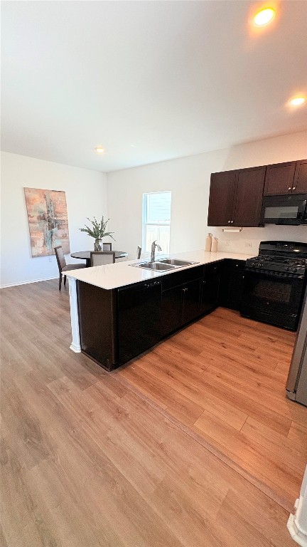 14300 Eientrill Pass Pflugerville, TX 78660 - Photo 6 of 19 a kitchen with stainless steel appliances kitchen island sink and cabinets