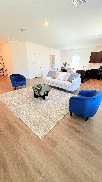 14300 Eientrill Pass Pflugerville, TX 78660 - Photo 10 of 19 a living room with furniture and a couch